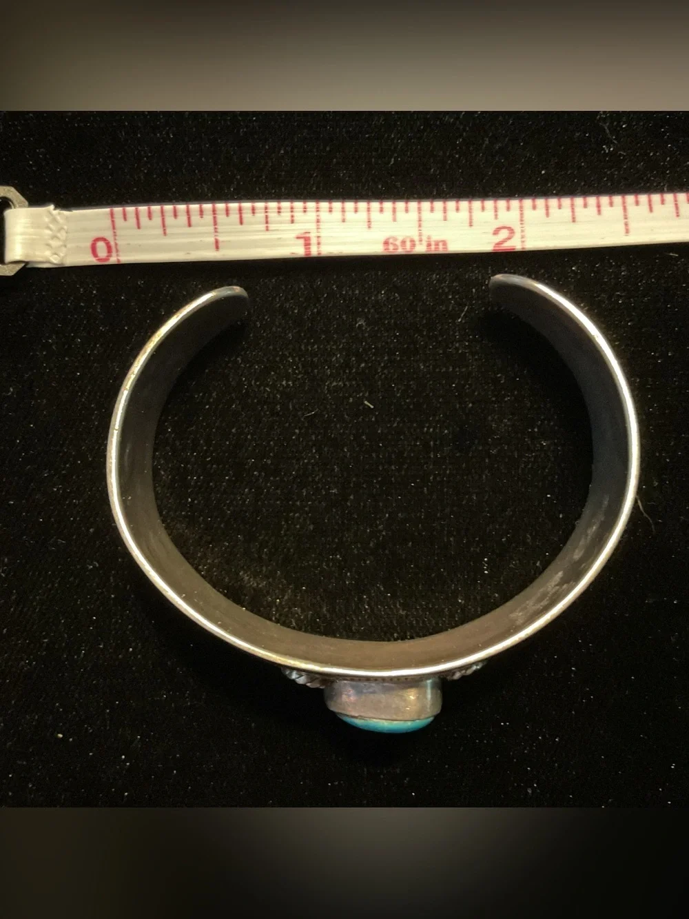 Vintage Navajo sterling 925 cuff bracelet featuring a central turquoise stone